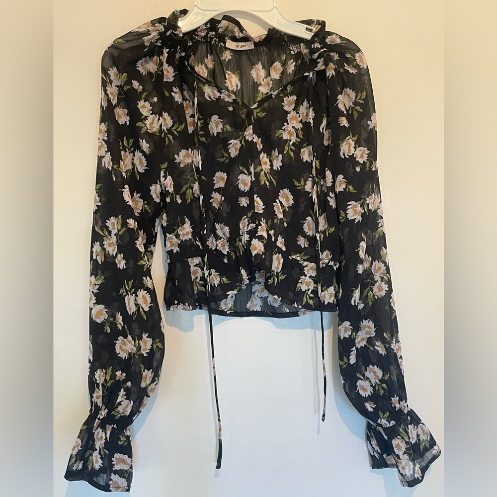 Flowery blouse.